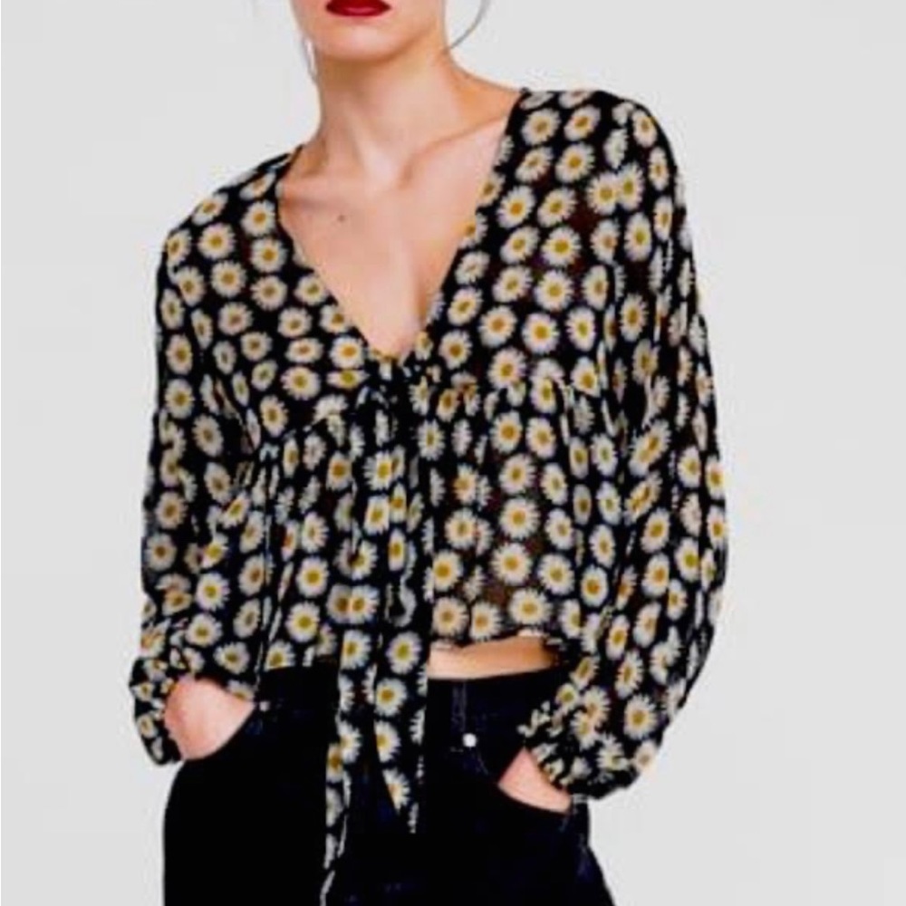 - Zara daisy print sheer blouse with sequinned bustier underneath.